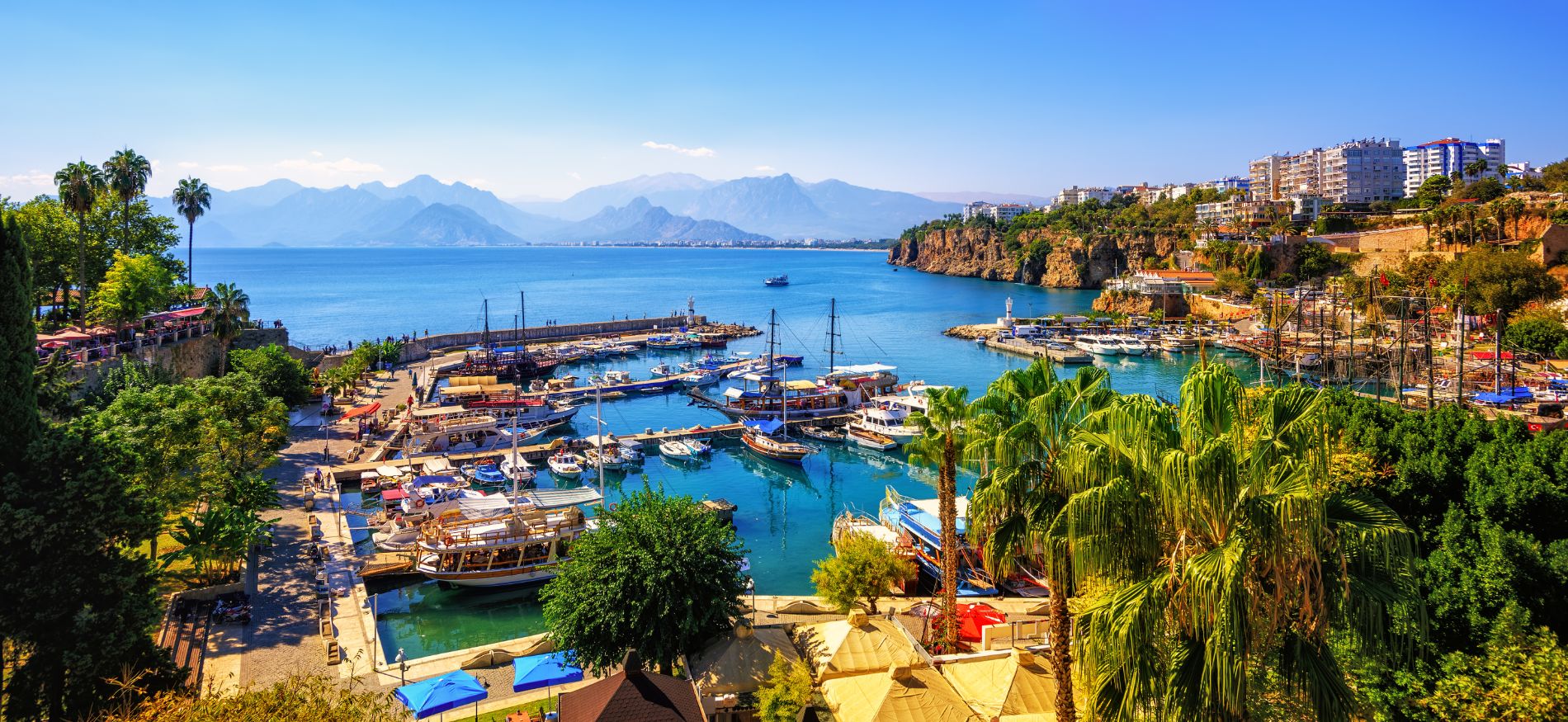 Panoramic view of Antalya Old Town port, Taurus mountains and Mediterrranean Sea, Turkey